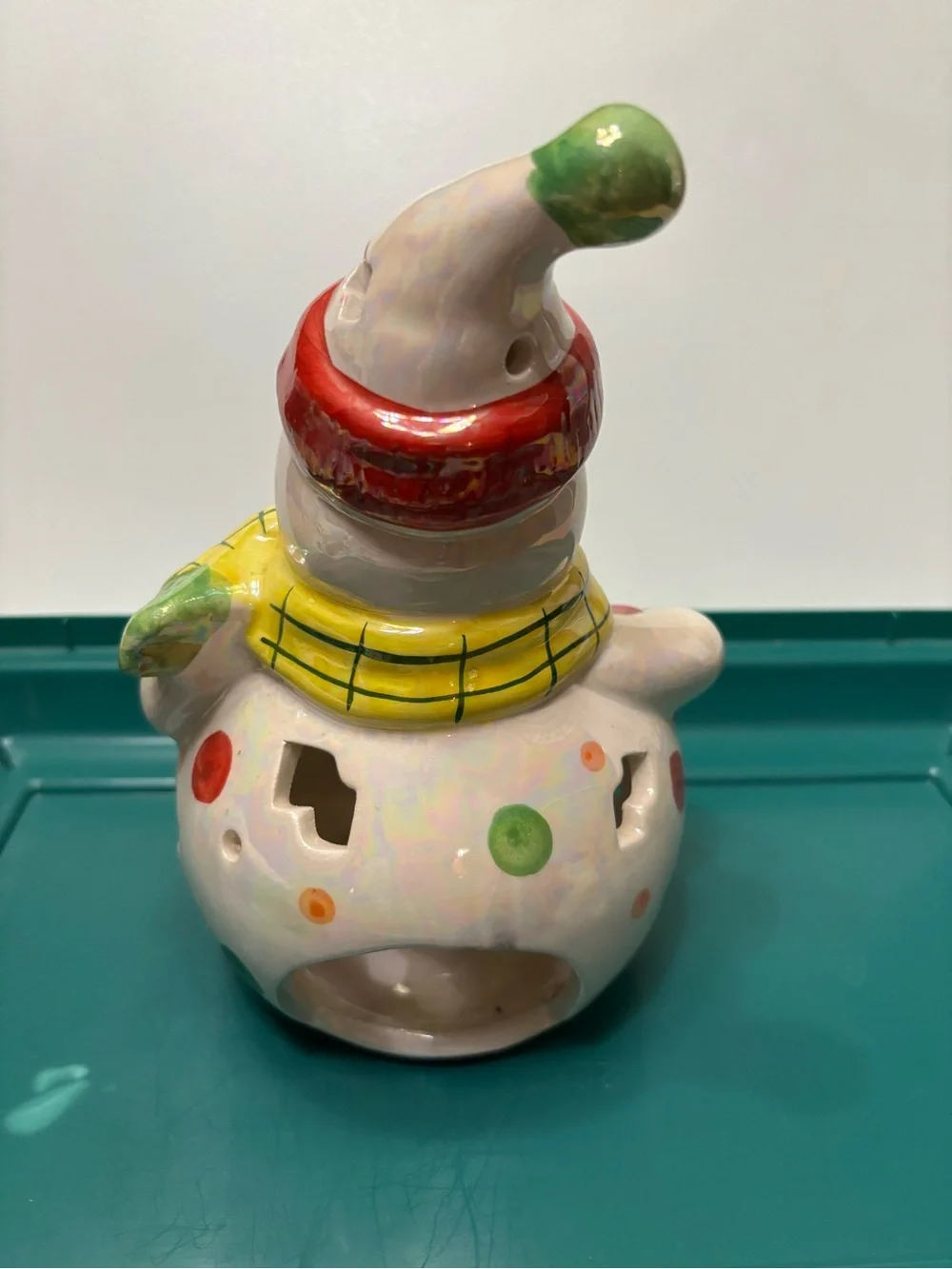 Ceramic snowman tealight decorative holder. Iridescent glaze.